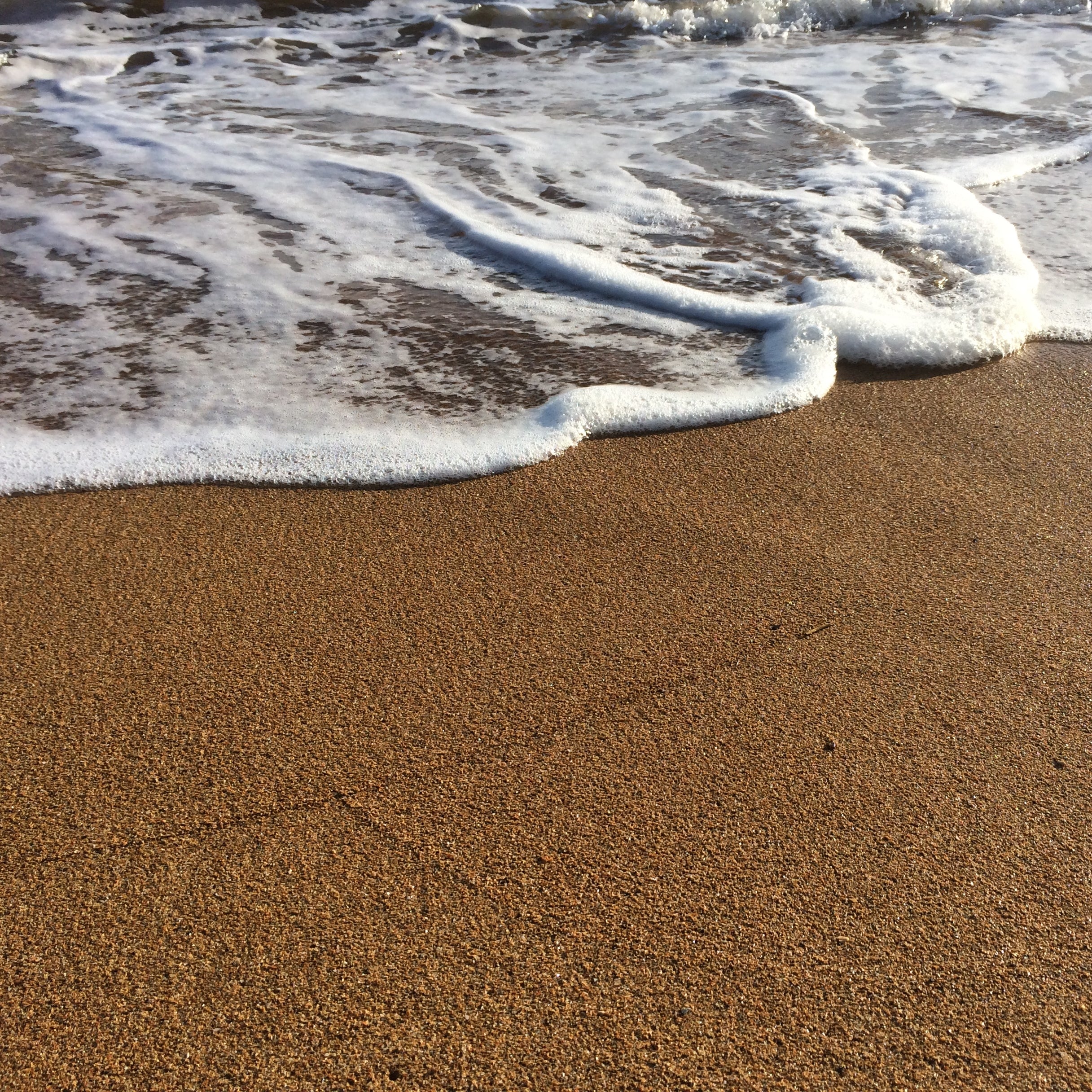 Close up of Waves on the Beach